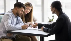 Couple at a table with a lender