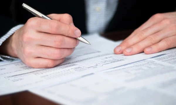 someone signing a bill