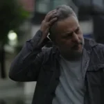 Man in rain frustrated with life about VA Loan study