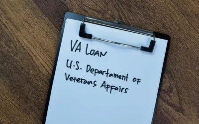 Veteran signs VA home loan papers and receives house keys, symbolizing closings resuming after the government shutdown ends and backlog clears