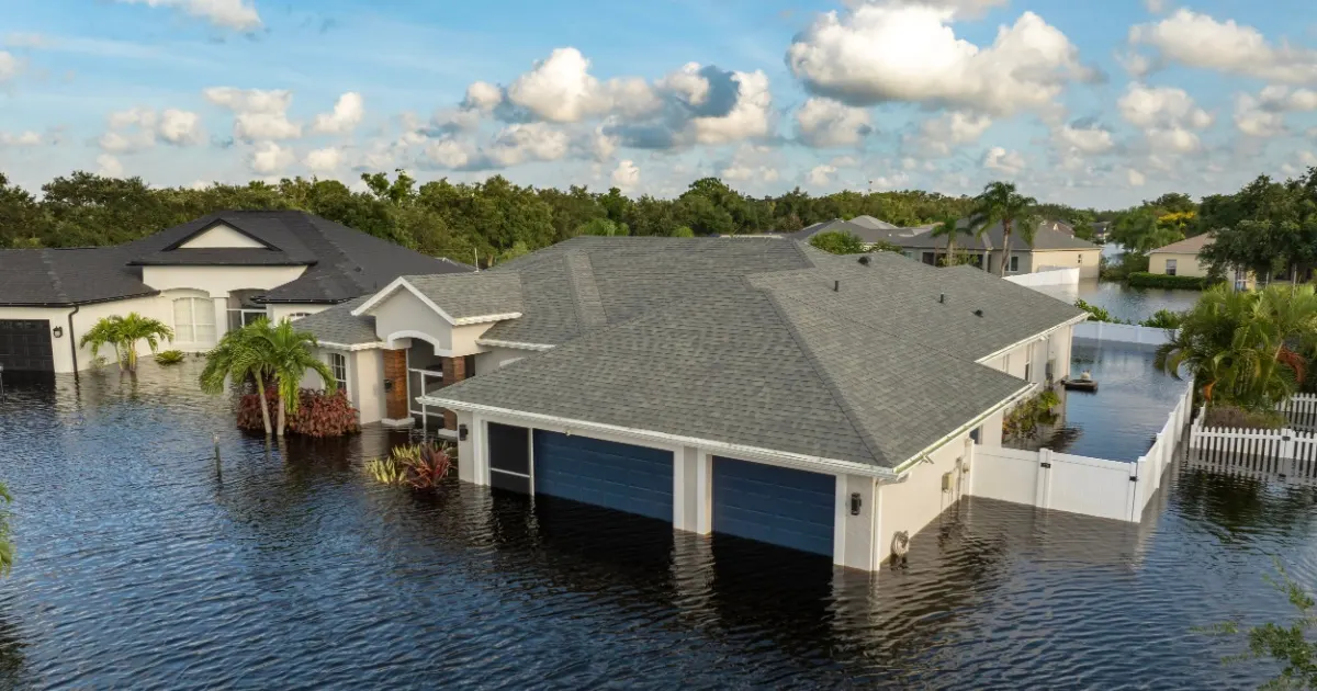 Aerial view of suburban homes in a residential neighborhood in a flood