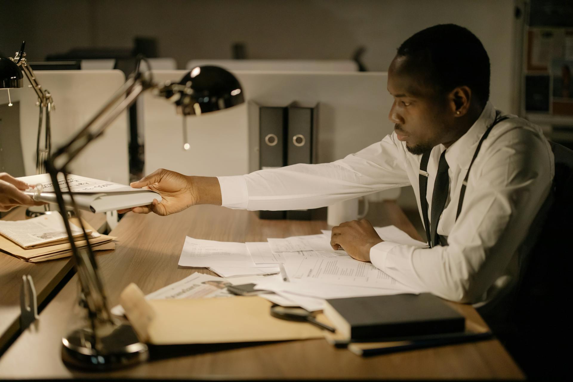 Professional reviewing VA Certificate of Eligibility entitlement codes at desk